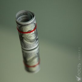 Доллар торгуется на бирже по 523,6 тенге