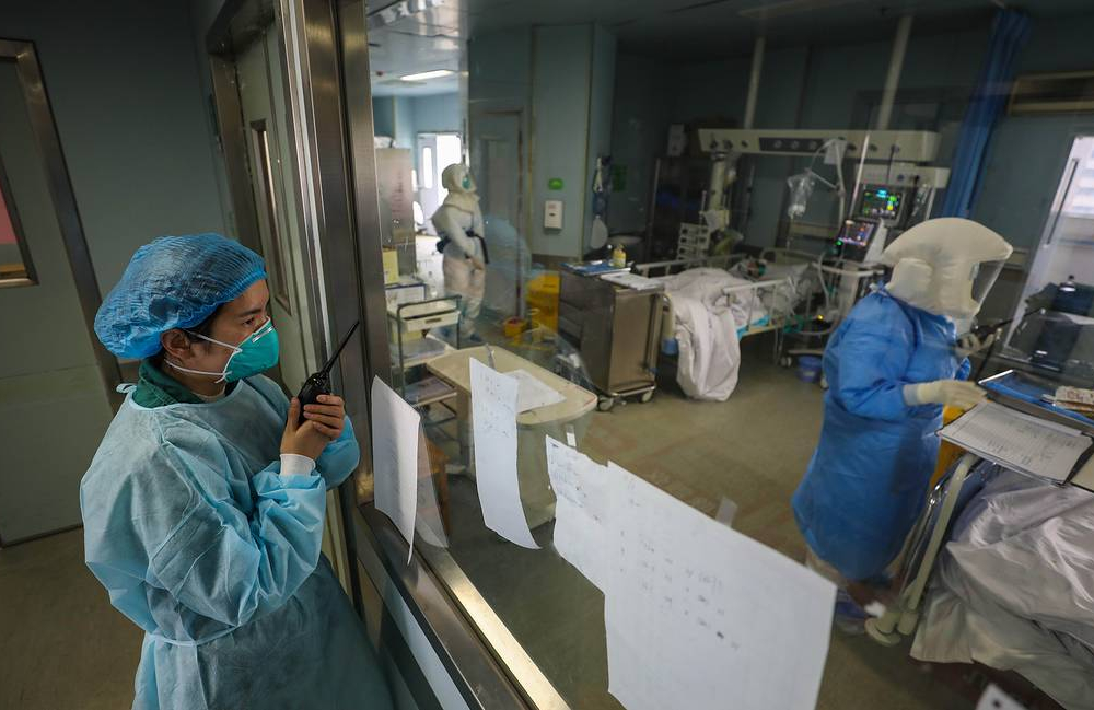Число заразившихся коронавирусом в Китае приблизилось к 64 тыс. человек