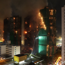 Число жертв пожара в Гонконге достигло 94 человек