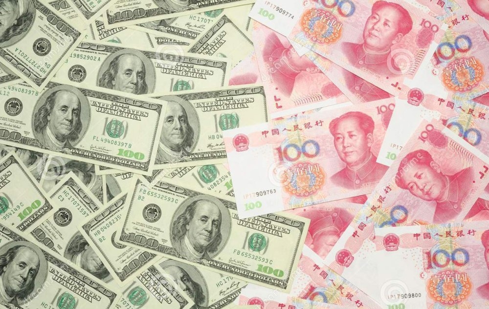 Банк Китая укрепил курс юаня к доллару на 0,41%