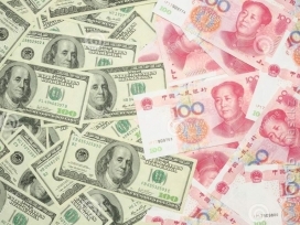 Банк Китая укрепил курс юаня к доллару на 0,41%