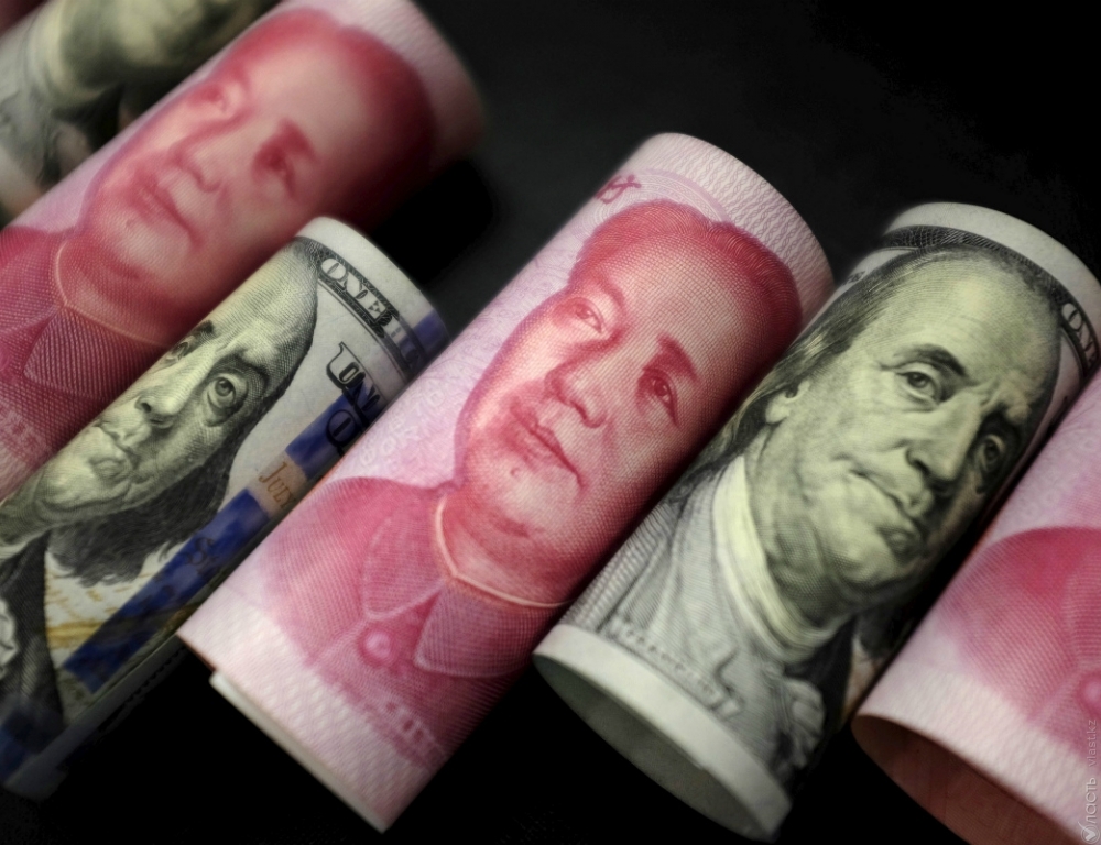 Народный банк Китая вновь понизил курс юаня 
